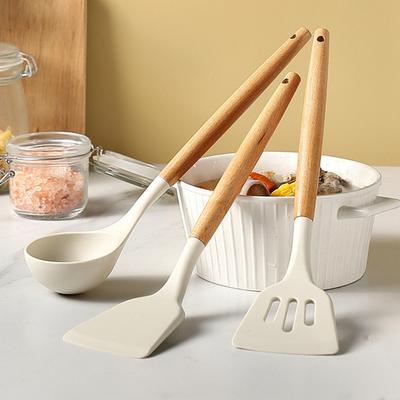 Espátula de cocina Fácil de limpiar Antiadherente de grado alimenticio Buen agarre Orificio para colgar Utensilio de cocina Resistente a altas temperaturas Mango de madera Espátula para freír Sopa