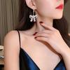 Celebrity bow pearl fringed earrings women's light luxury high-end earrings fashionable exquisite versatile earrings