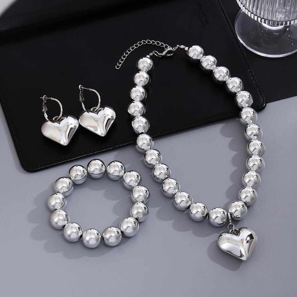 Elegante Set di Orecchini a Forma di Cuore e Bracciale Geometrico con Collana con Ciondolo a Cuore