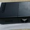 Best-Selling YG300 Yellow-White Mini Portable Projector with Mobile Screen Mirroring for Home Entertainment.