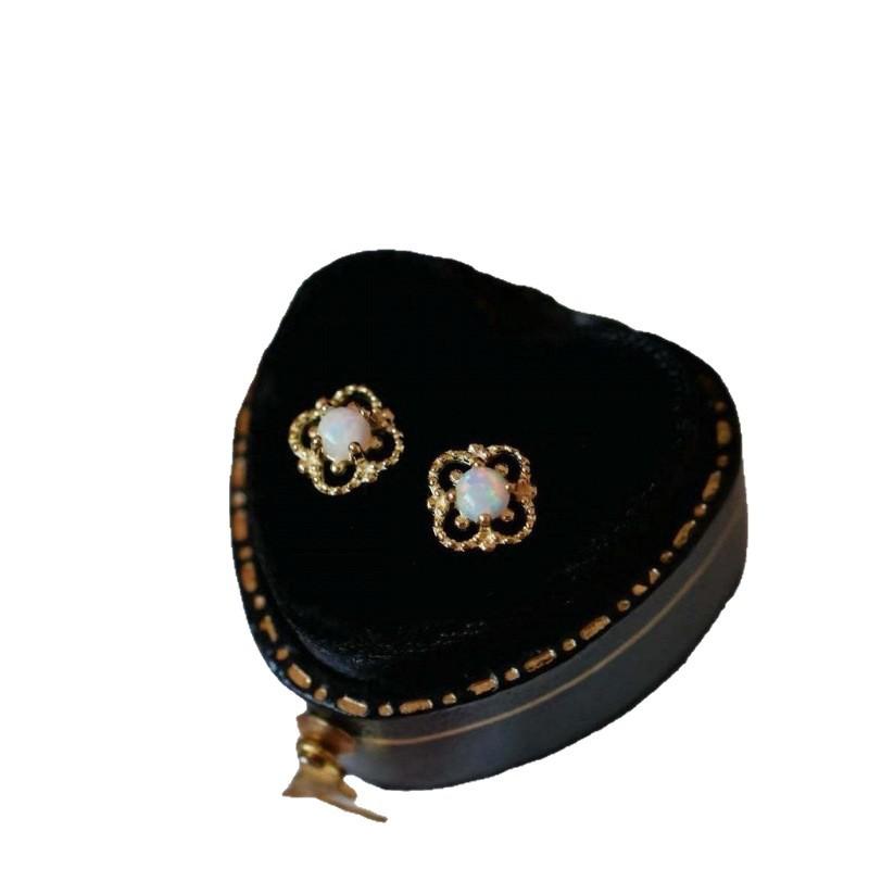 Hot sale Korean version of small fresh four-leaf clover white opal hollow flower stud earrings women's earrings retro ear jewelry