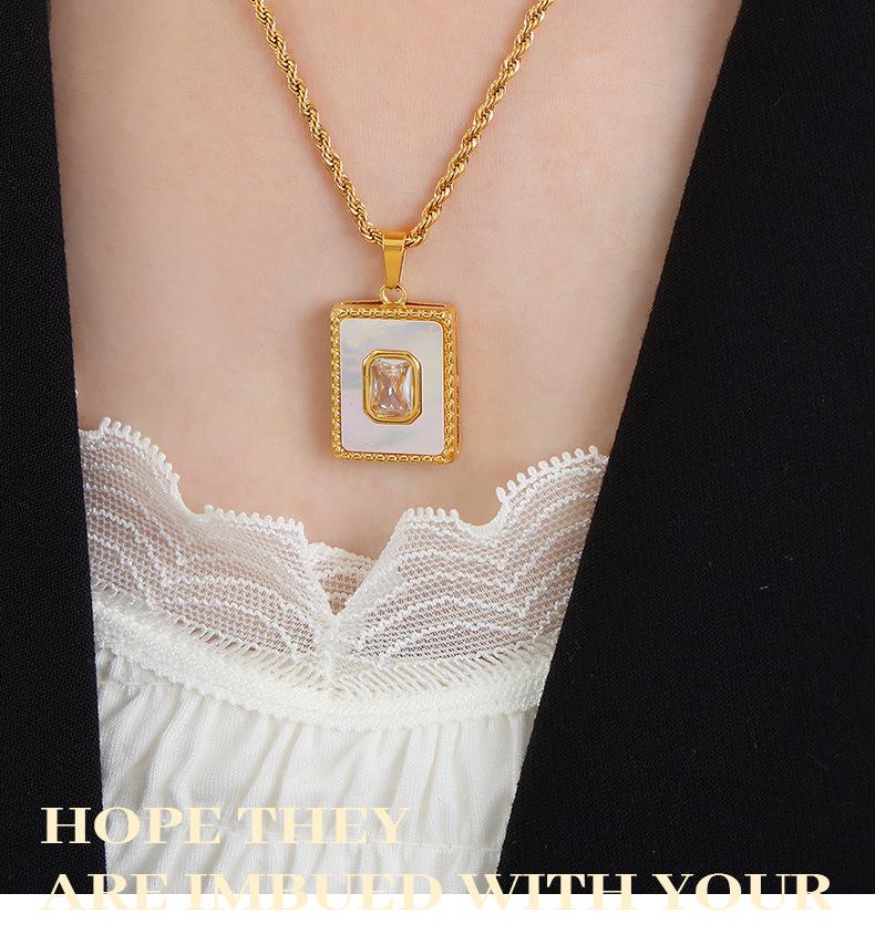 Elegant White Mother-of-Pearl Pendant Necklace - European and American Design, Versatile Titanium Steel Clavicle Chain for Women.