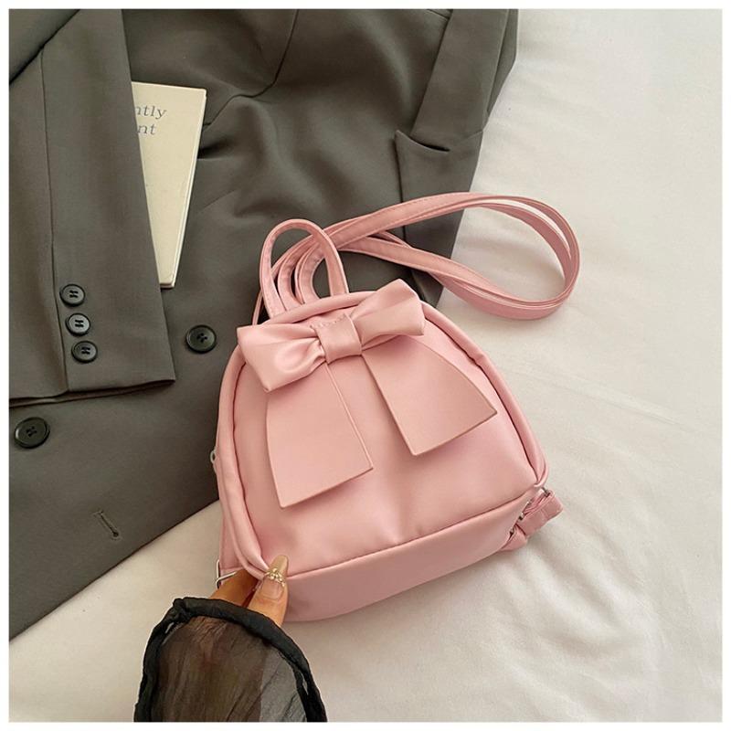 Beautiful solid color handbag women's new fashionable exquisite backpack bow casual student schoolbag