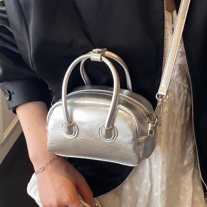 New product simple style niche solid color portable Boston bag commuting versatile casual texture messenger women's bag