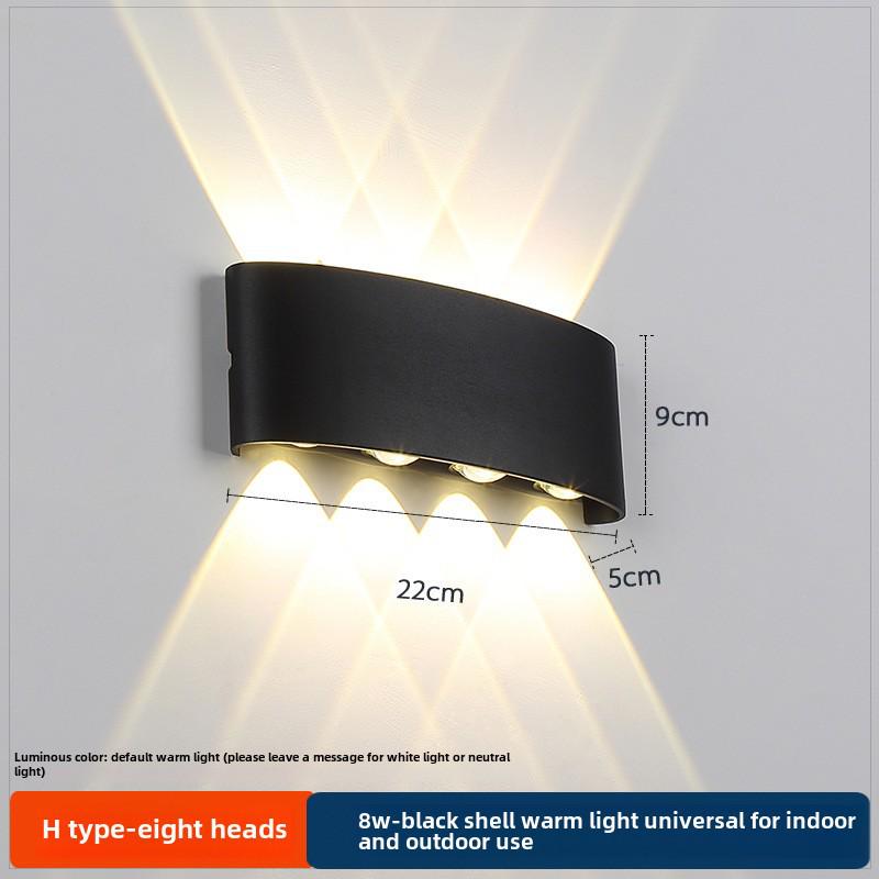 LED Outdoor Four-Leaf Clover Wall Light - Up and Down Beam Decoration for Garden and Exterior Walls.
