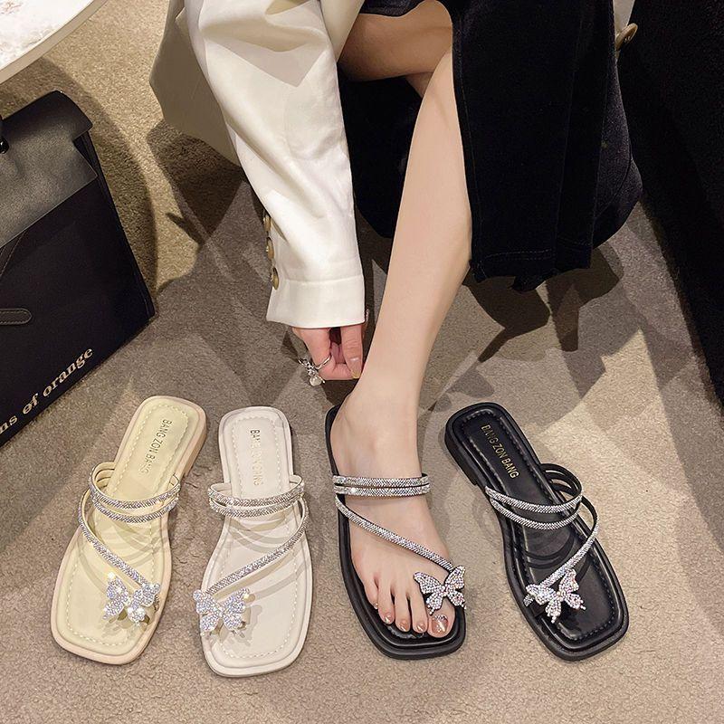 Rhinestone bow flat sandals women's summer 2025 new flat half tray ins fairy wind beach shoes