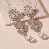 European and American pearl petal fringed earrings light luxury high-end stud earrings temperament versatile earrings design sense niche