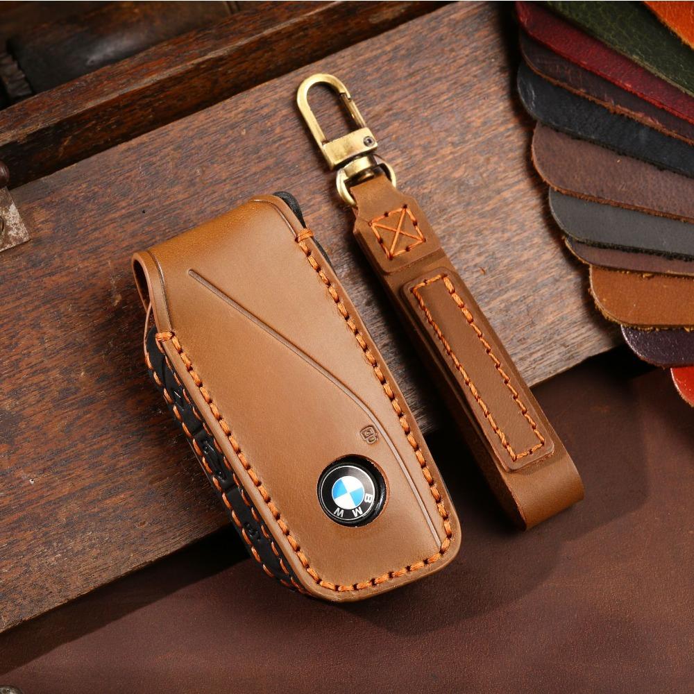 Applicable to 2023 BMW i7 key bag ix genuine leather X7 new 7 series XM car key protective case buckle cowhide