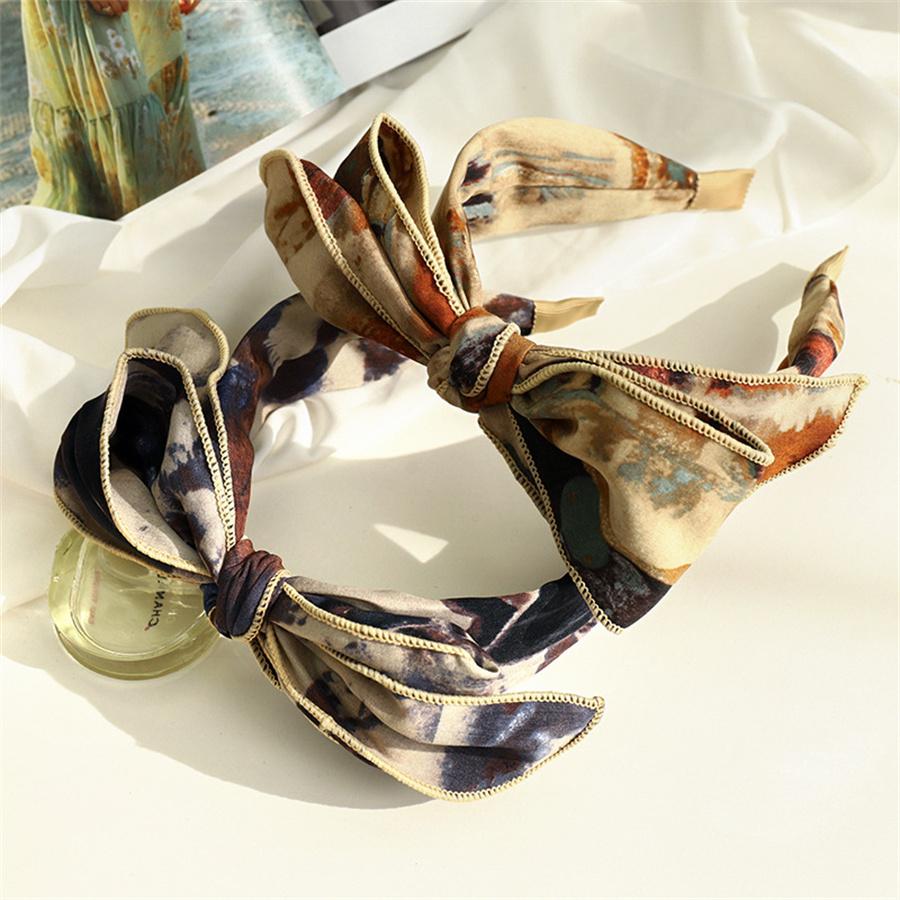 

Korean fashion retro temperament bow headband wide-brimmed hairpin women s fabric simple outer wear headband hair accessories