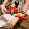 Cute Parrot Plush Wristband with Snap Closure. Colorful Bird-shaped Wearable Toy for Kids, Lovely Collectible Accessory.