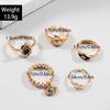 Fashion jewelry Vintage carved sun feather cross black gemstone ring multi-piece set set
