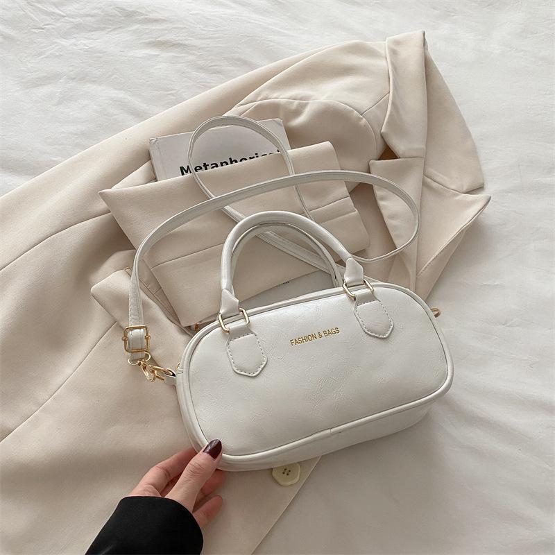 Portable New Bowling Bag Women's 2025 Spring and Summer New Korean Version Fashion Shoulder Bag Simple Casual High Texture