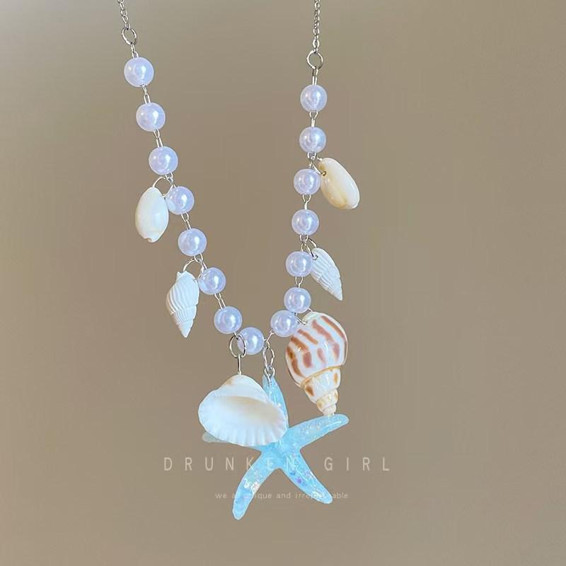 Summer starfish shell necklace niche design sense dopamine imitation pearl white collarbone chain seaside vacation photo