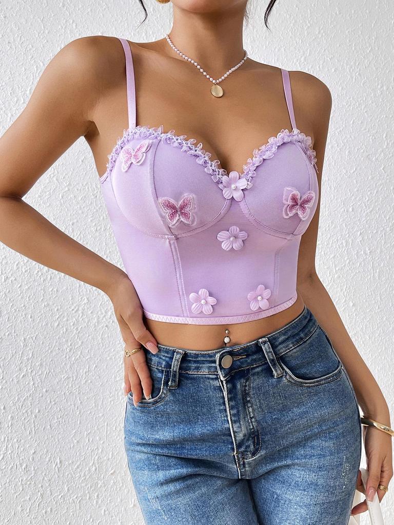 Gorsetowy top z haftem motyla i fiszbinami