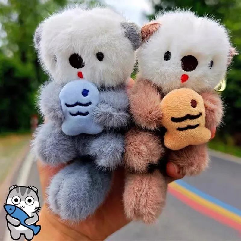2pcs Fashion Lovely Plush Otters Holding Fish Key Chains Cartoon Cute Otters School Bag Pendant Keyring Funny Toy Student Gifts