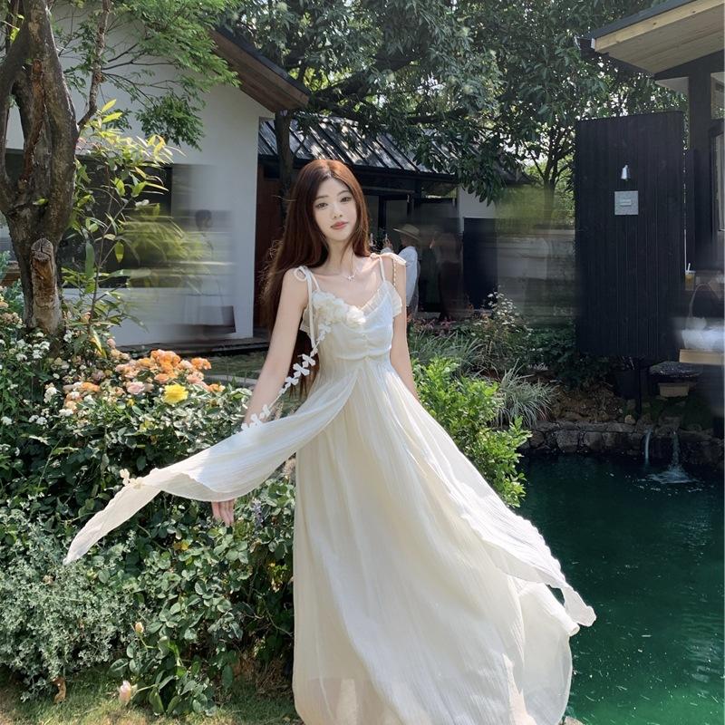 Holiday style flower design suspender dress women's 2026 summer new waist thin very fairy long skirt