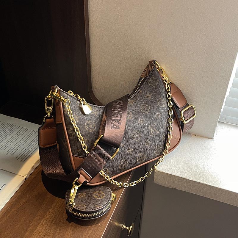 

Niche contrasting color underarm bag women s new retro chain bag fashion printing single shoulder dumpling bag коричневый