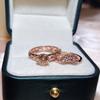 Hollow Patterned Couple Ring with Micro Set Luxury Imitation Diamond Zircon Proposal Ring