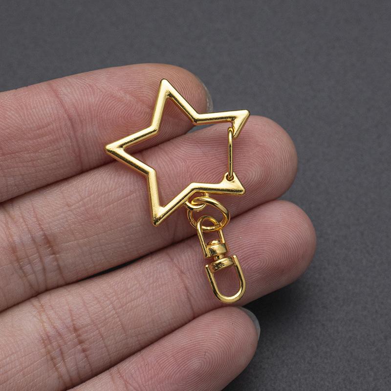 20 ks Klip na klíče ve tvaru hvězdy s pružinovým uzávěrem a řetízkem, závěsná přezka, otevřený spojovací kroužek a kovová otočná karabina pro DIY výrobu šperků