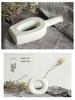 White Ceramic Vase with Dried Baby's Breath for Living Room or Dining Table Decoration
