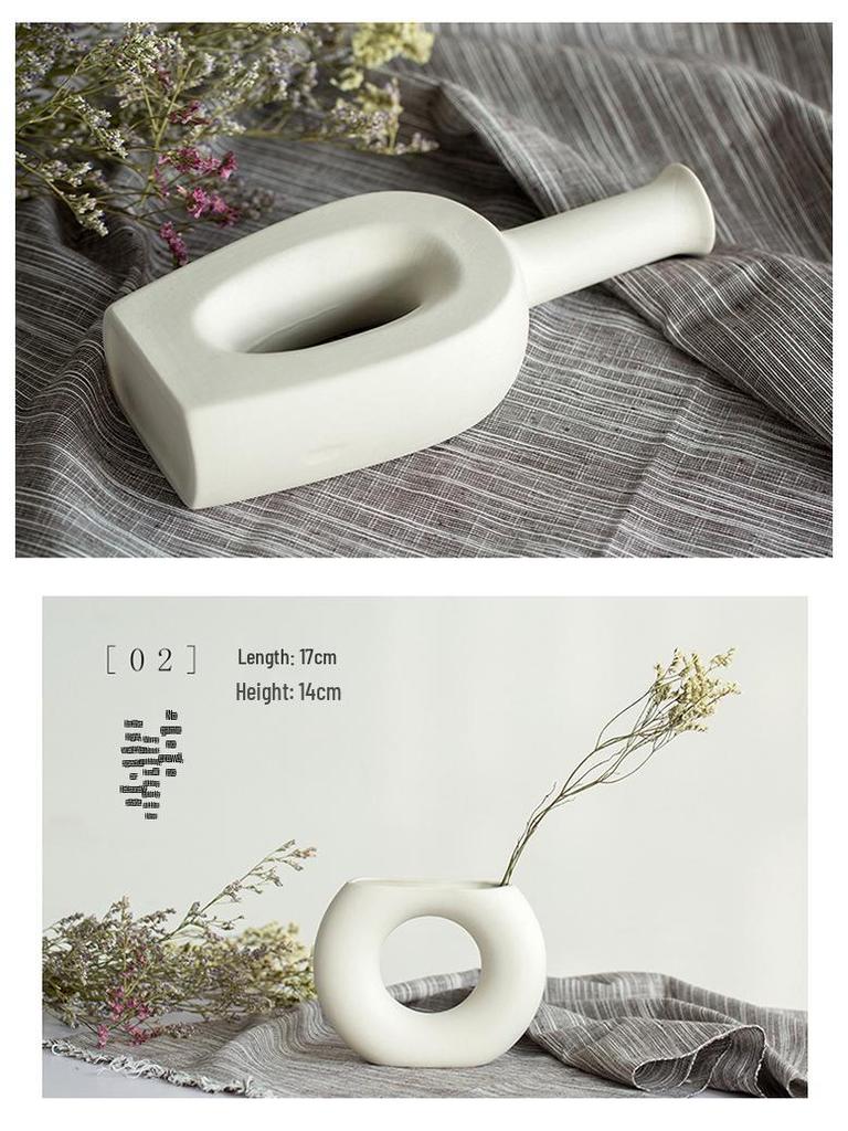 White Ceramic Vase with Dried Baby's Breath for Living Room or Dining Table Decoration