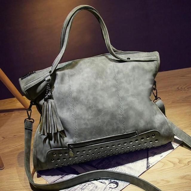 grey studded bolsa