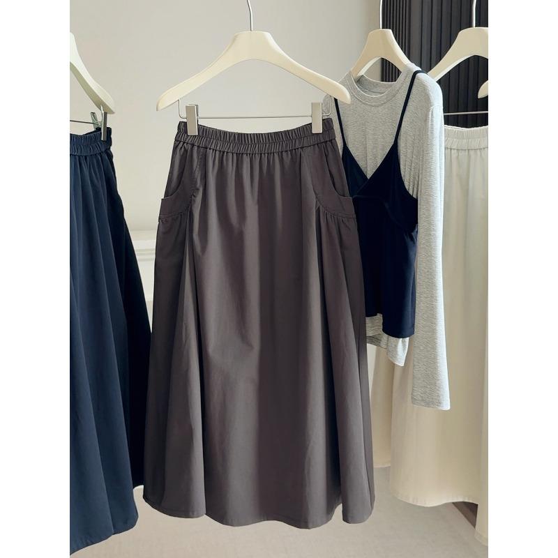 Spring and Autumn new elastic waist loose pocket skirt women's high waist A-shaped skirt big pendulum medium and long umbrella skirt