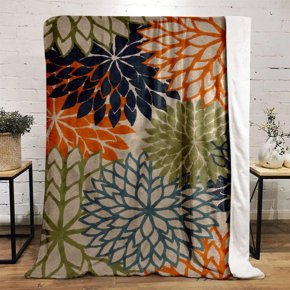 Bold, overlapping floral designs in orange, navy, green, and teal tones. for all seasons blanket lunch break throw gift
