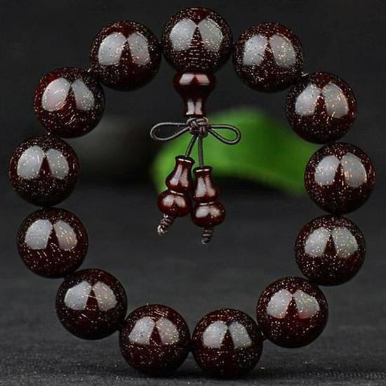 Herren Armband aus rotem Sandelholz mit goldenem Stern Agarholz Buddhistische Gebetsperlen