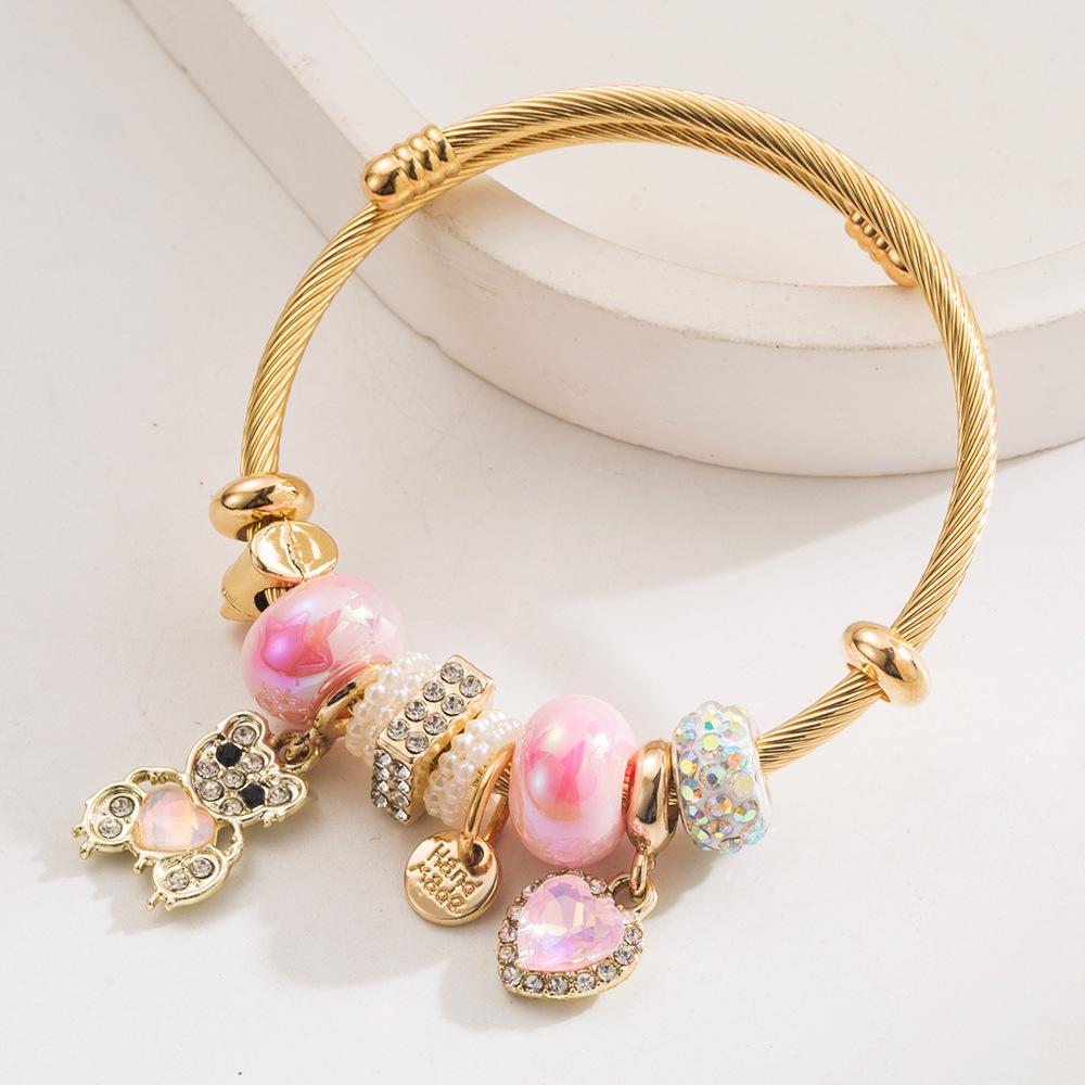 

Браслет-шарм Pandora з нержавіючої сталі з серцем та ведмедиком зі стразами