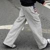 Evropská a americká podzimní a zimní pouliční móda, potištěné volné provedení, dlouhé dámské ležérní kalhoty