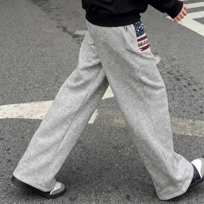 Evropská a americká podzimní a zimní pouliční móda, potištěné volné provedení, dlouhé dámské ležérní kalhoty