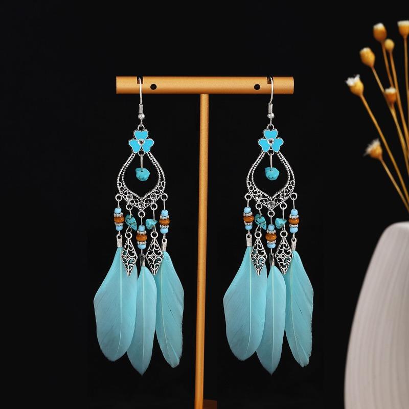 

Bohemian colored feather clip fabric fringed rice bead earrings, retro high-end hollow earrings