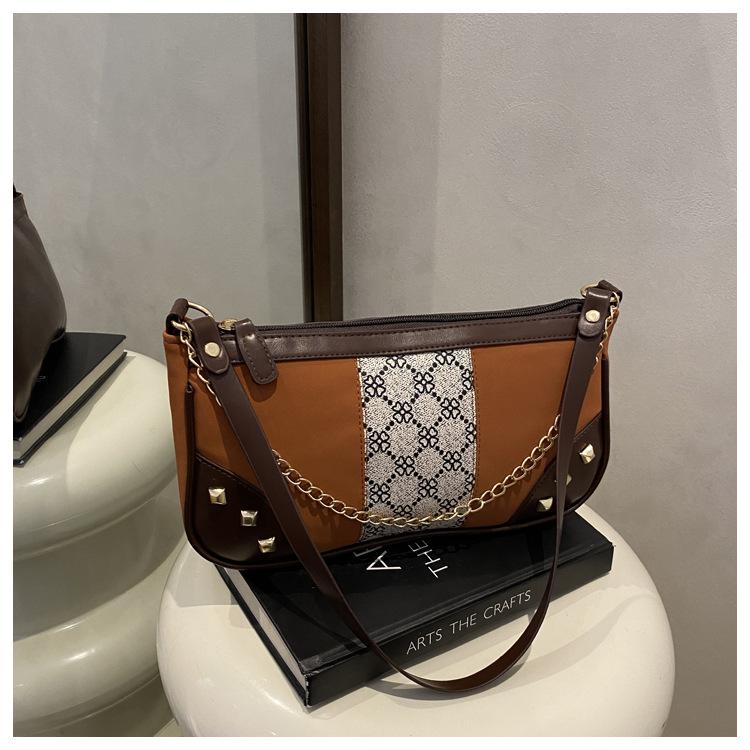 

Сумка-багет с текстурой ниши для интернет-знаменитостей, женская, 2025, новая, сумка под мышкой, универсальная, супер трендовая сумка на плечо в стиле инс коричневый