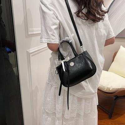 Sac de niche haut de gamme pour femme 2025 printemps nouveau populaire polyvalent sac bandoulière sac seau portable