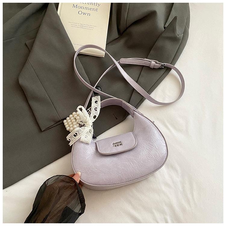 

Handbag Women s 2025 New Summer Premium Textured Crescent Bag Versatile Commuter Bag One Shoulder Underarm Bag