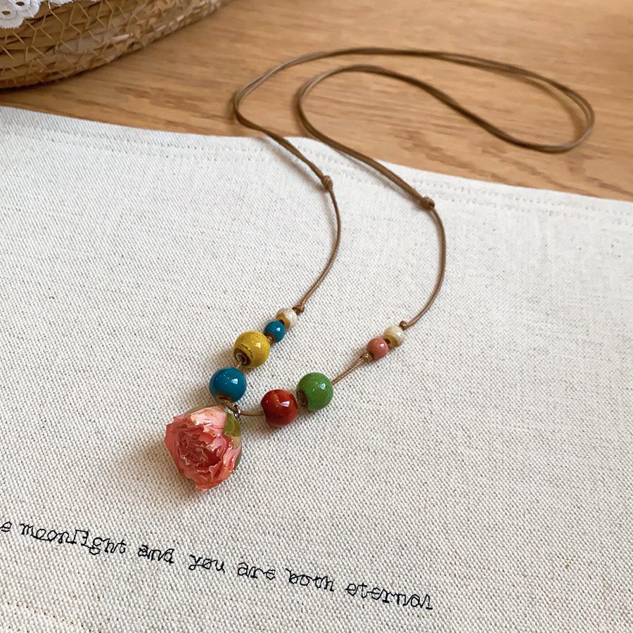 High-End Ceramic Flower Necklace: Creative Leather Cord Collarbone Chain for Women