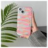 The new pink graffiti iPhone15 mobile phone case is suitable for Apple 14promax transparent shock absorption 13 soft case, anti-drop.