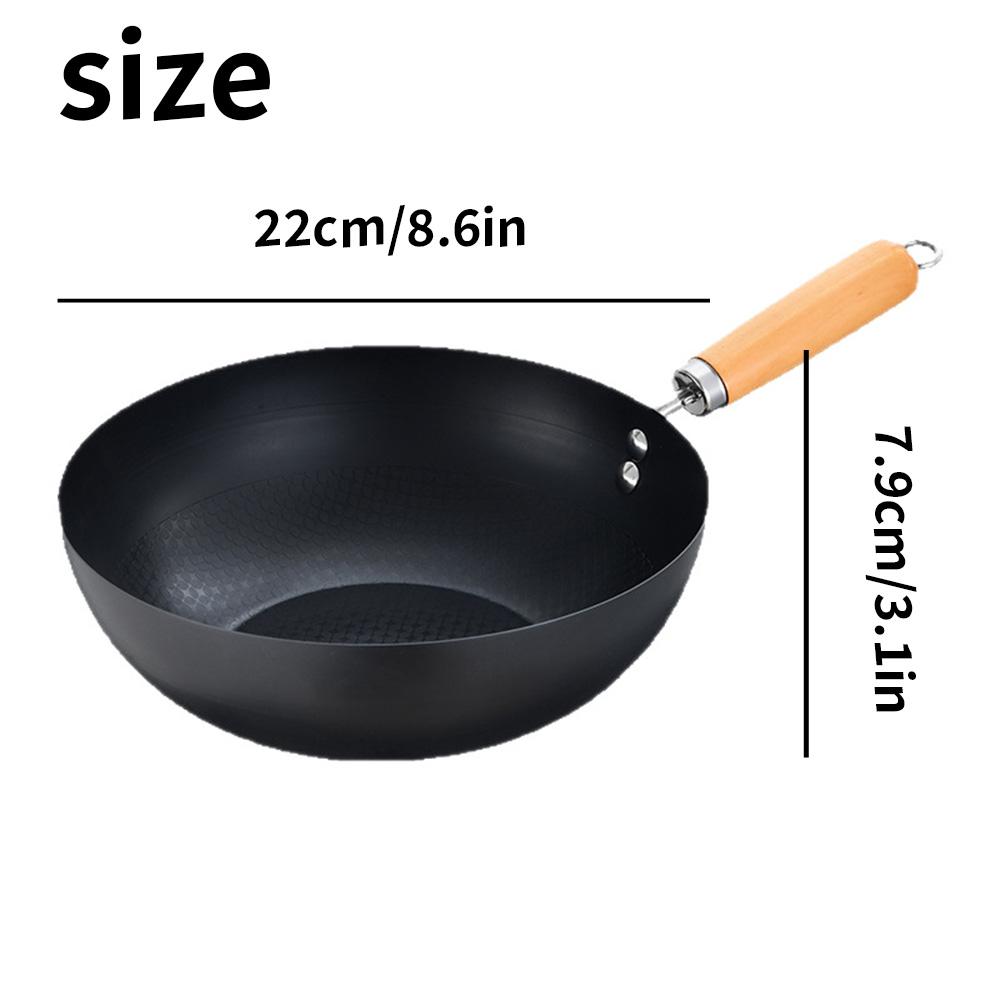 A deep circular, stir fry iron pan, uncoated and non stick pan, compatible with induction cookers
