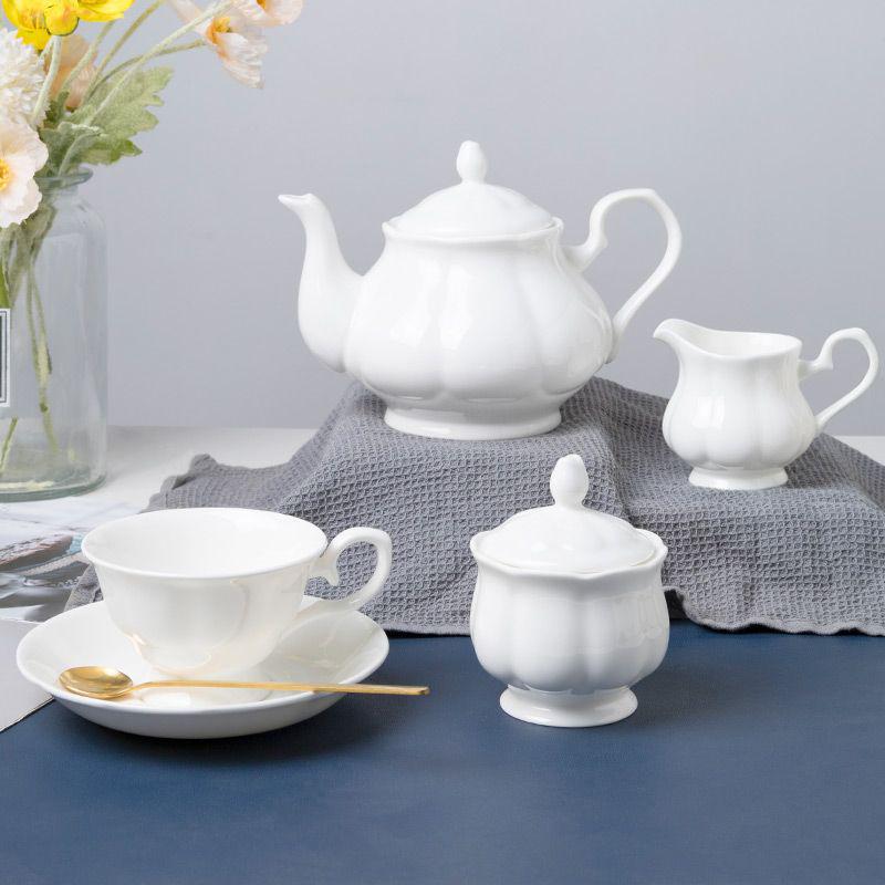 English Style White Ceramic Coffee Set: 7-Piece Bone China Cup, Pot, Saucer & Spoon.