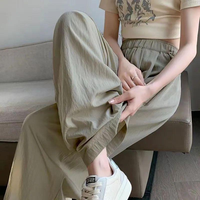 Ice Silk Women's High-Waist Pleated Wide-Leg Pants for Spring, Summer, and Autumn.