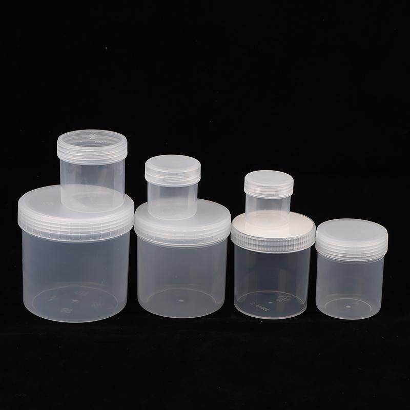 Průhledná uzavřená plechovka s víkem Plastová prázdná balící láhev Kruhové úložiště kbelík Sklenice na sušenky Potravinářské uzavřené plechovky Nádržka