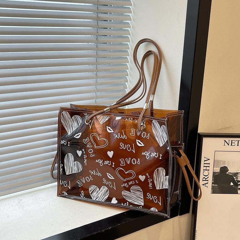 

Summer popular large-capacity tote bag women s new fashion graffiti shoulder jelly bag mother and child bag коричневый