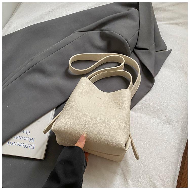 

Fashion lychee pattern handbag women s 2025 new retro bucket tote bag large capacity shoulder messenger bag tide белый