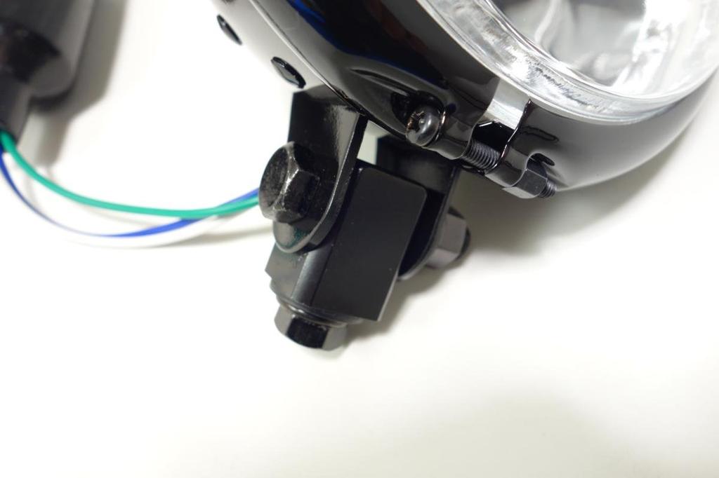 5.5-inch Bates-style headlight, black body, H4 bulb, custom headlight with clear lens.