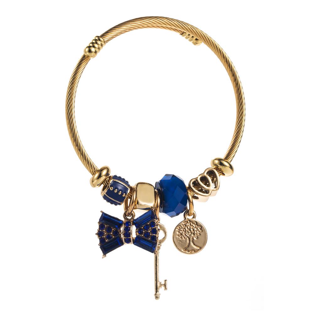 Bracelet Panjia Fashion Or Acier Inoxydable Nœud Papillon avec Perles de Cristal et Pendentif Strass.