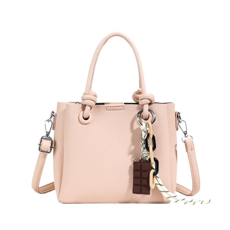 

Wholesale hot sale niche simple style solid color portable bucket bag commuting versatile high-end feeling foreign messenger bag woman