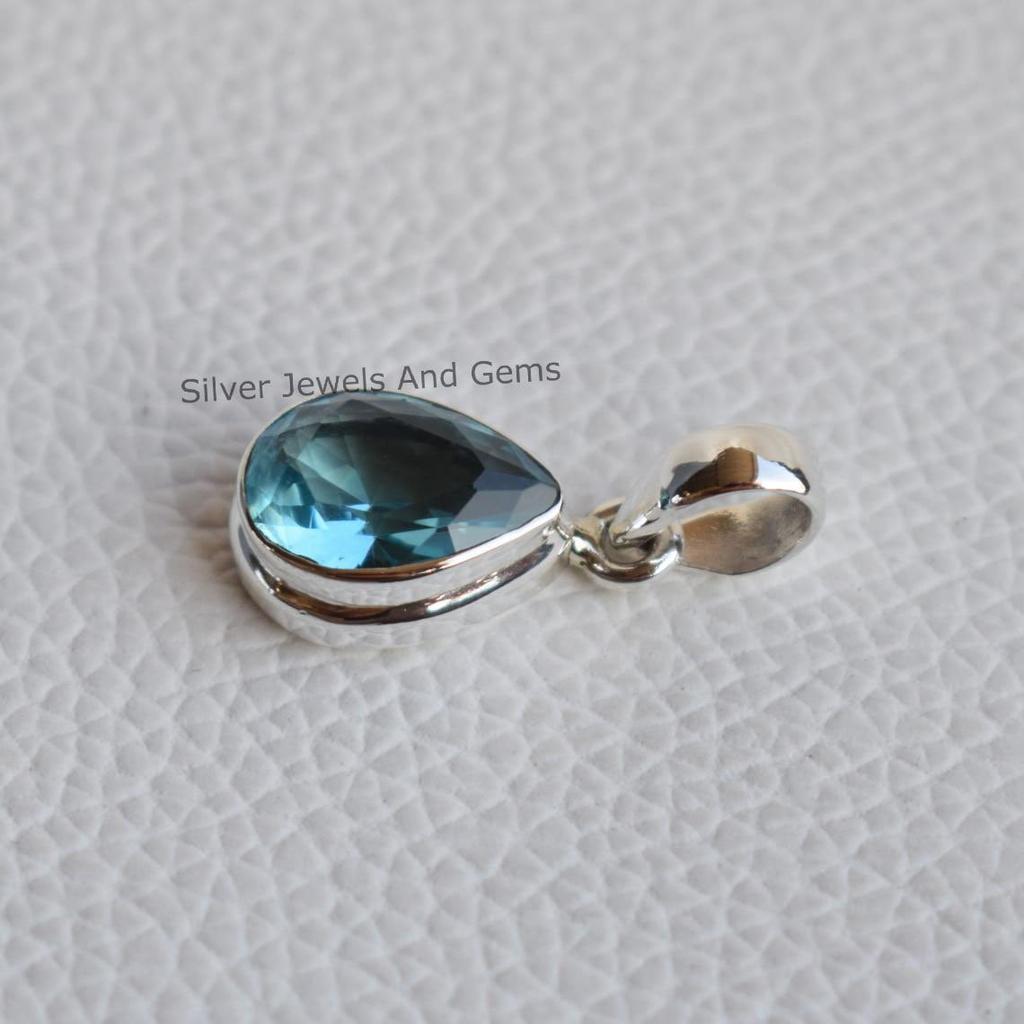 Handmade Teardrop Blue Topaz Pendant: 925 Sterling Silver