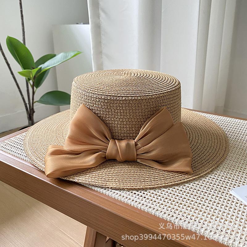 Hat Women's New Spring and Summer Straw Bow Straw Hat Versatile Flat Top Sunscreen Sun Hat Tide