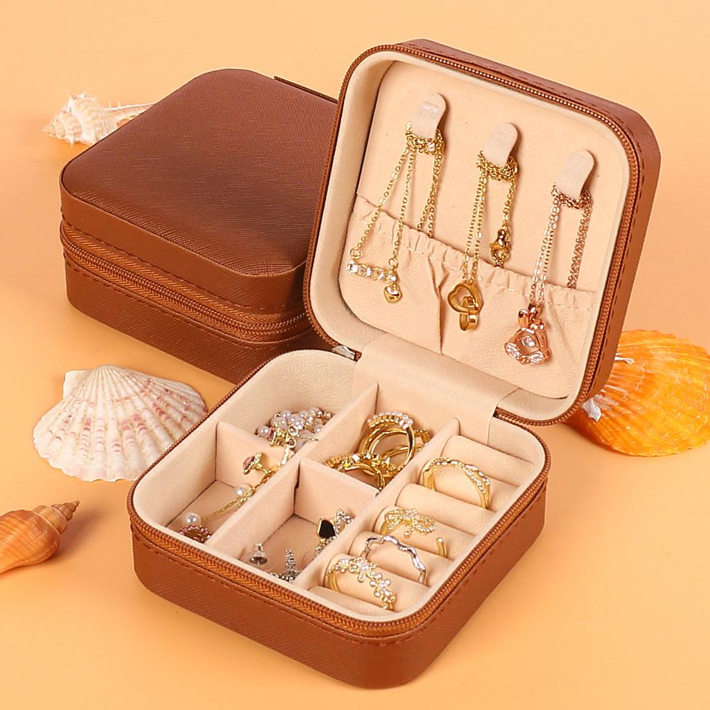 Tragbare Schmuckaufbewahrungsbox Reise-Schmuckorganizer-Etui Lederaufbewahrung Ohrringe Halskette Ring Schmuckdisplay